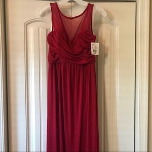 Never worn, mesh sleeveless bridesmaid dress.